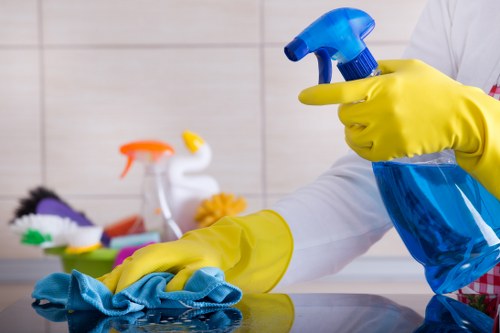 Professional carpet cleaning equipment being used on a living room carpet