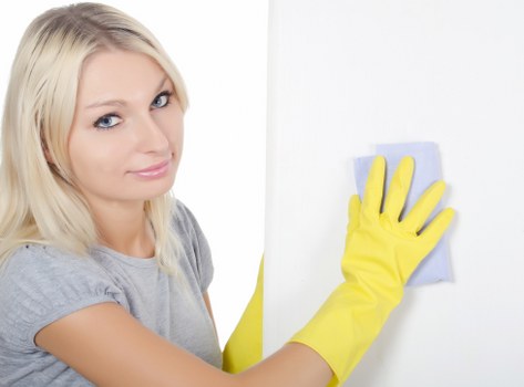 Staff member wearing PPE during carpet cleaning